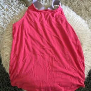 First tank is athletic and second tank is avia